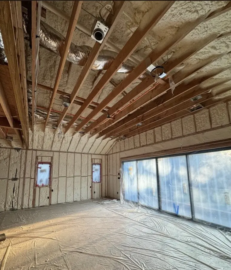 Interior walls and ceiling insulated with spray foam during new construction in Riverdale
